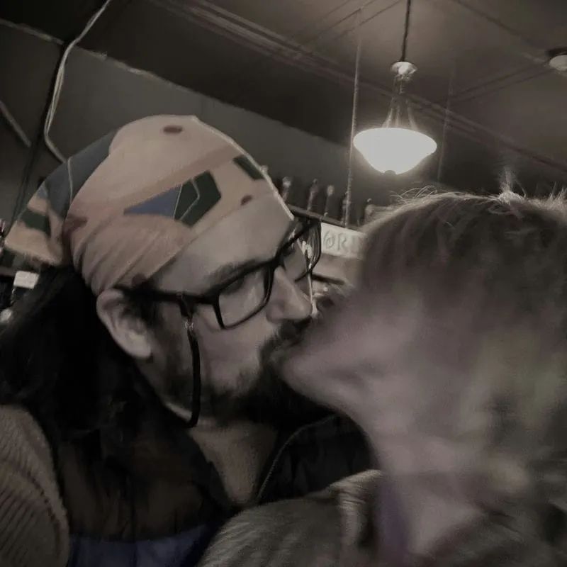 Eph & Lou do a little PDA at Manette Saloon